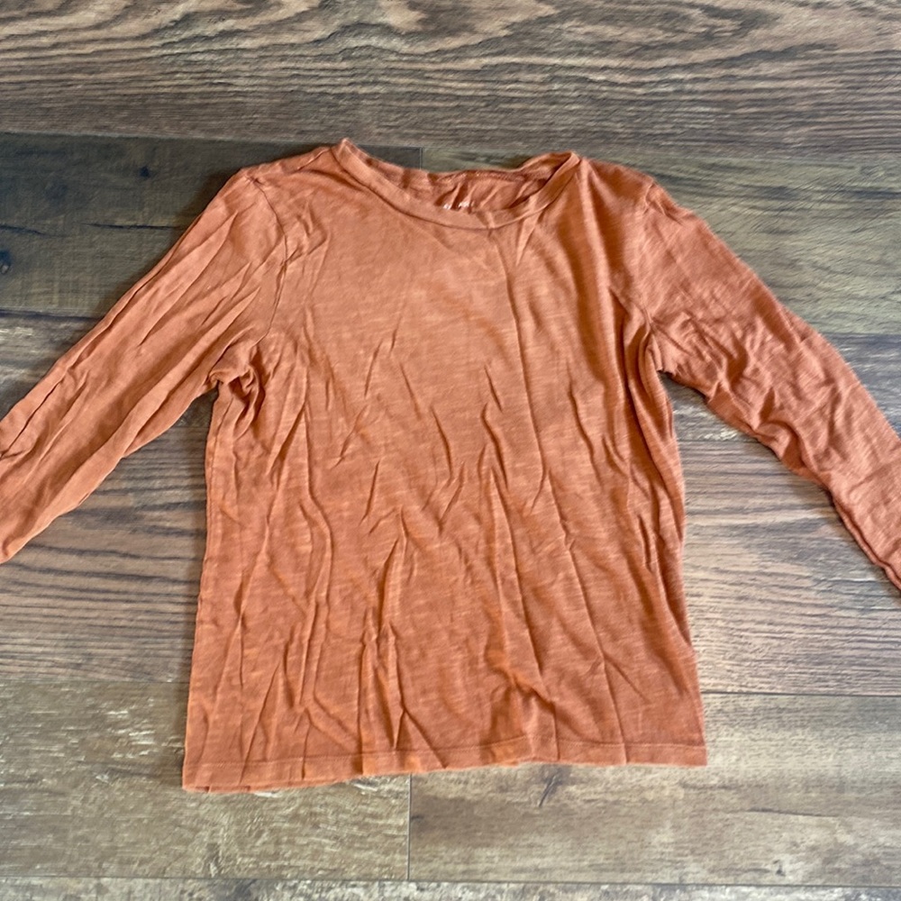 long orange/brown shirt